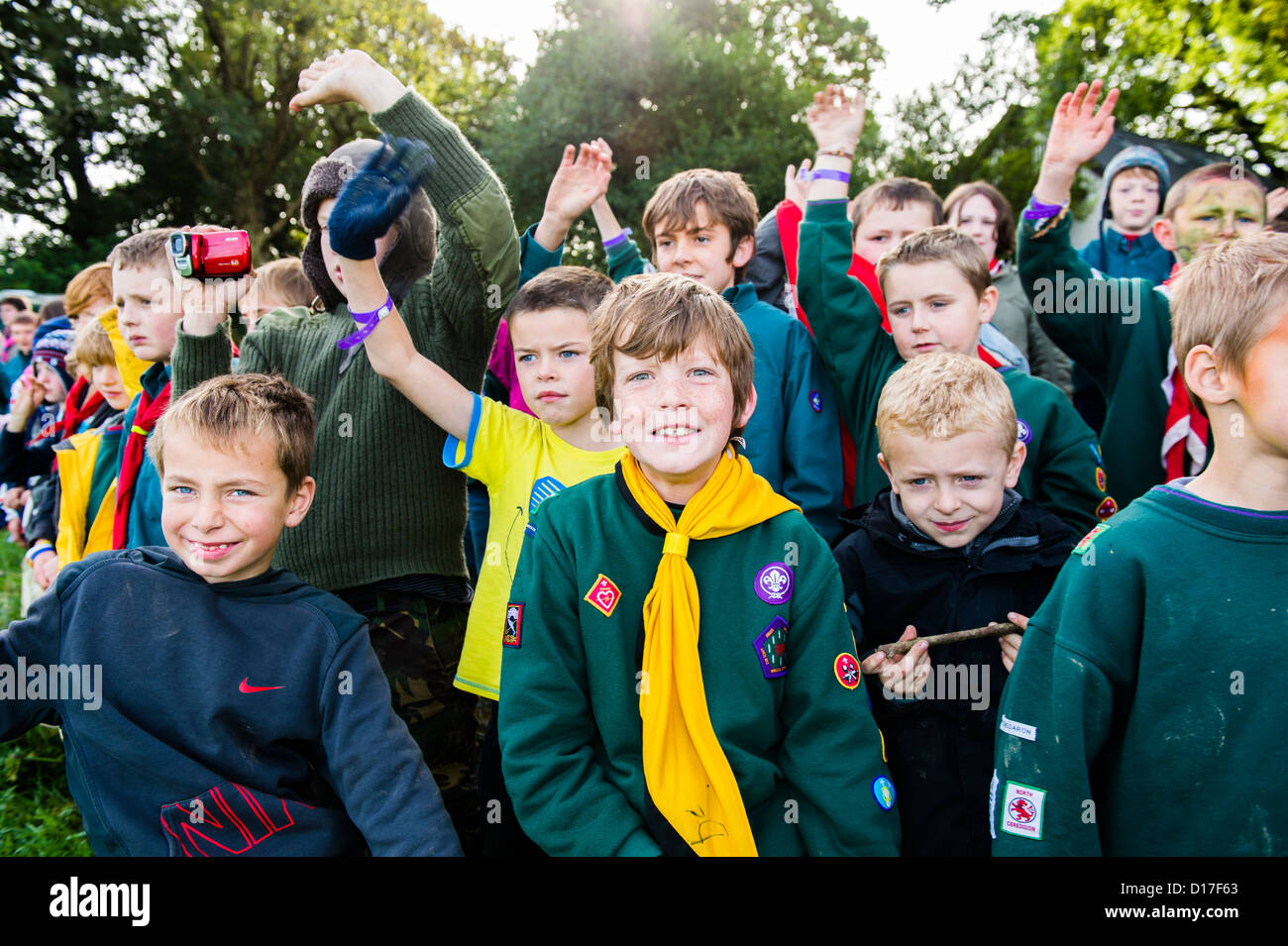 A group of boy and girl Scouts and cubs at a camp in Ceredigion, West Wales, UK Stock Photo