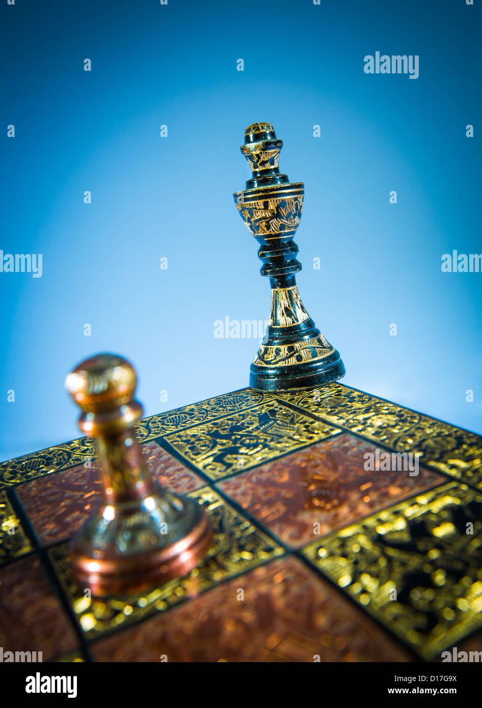 chess checkmate on a blue background Stock Photo