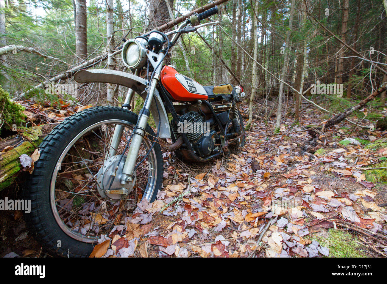 Abandoned Yamaha 250 motorcycle near the Mt Cilley Trail in Woodstock, New Hampshire USA Stock Photo