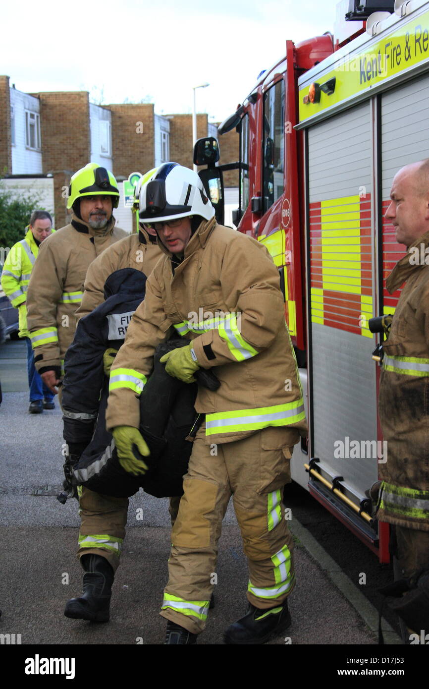 Fire crews put their rescue skills to the test on Monday (10 December) when they took part in a training exercise at one of Gravesend's tallest buildings.  Firefighters were given the scenario that a resident in a ninth floor flat had been cooking some festive nibbles in preparation for the big day but had been distracted, leaving the food to go up in flames. Fire crews put their rescue skills to the test on Monday (10 December) when they took part in a training exercise at one of Gravesend's tallest buildings.  Firefighters were given the scenario that a resident in a ninth floor flat had bee Stock Photo