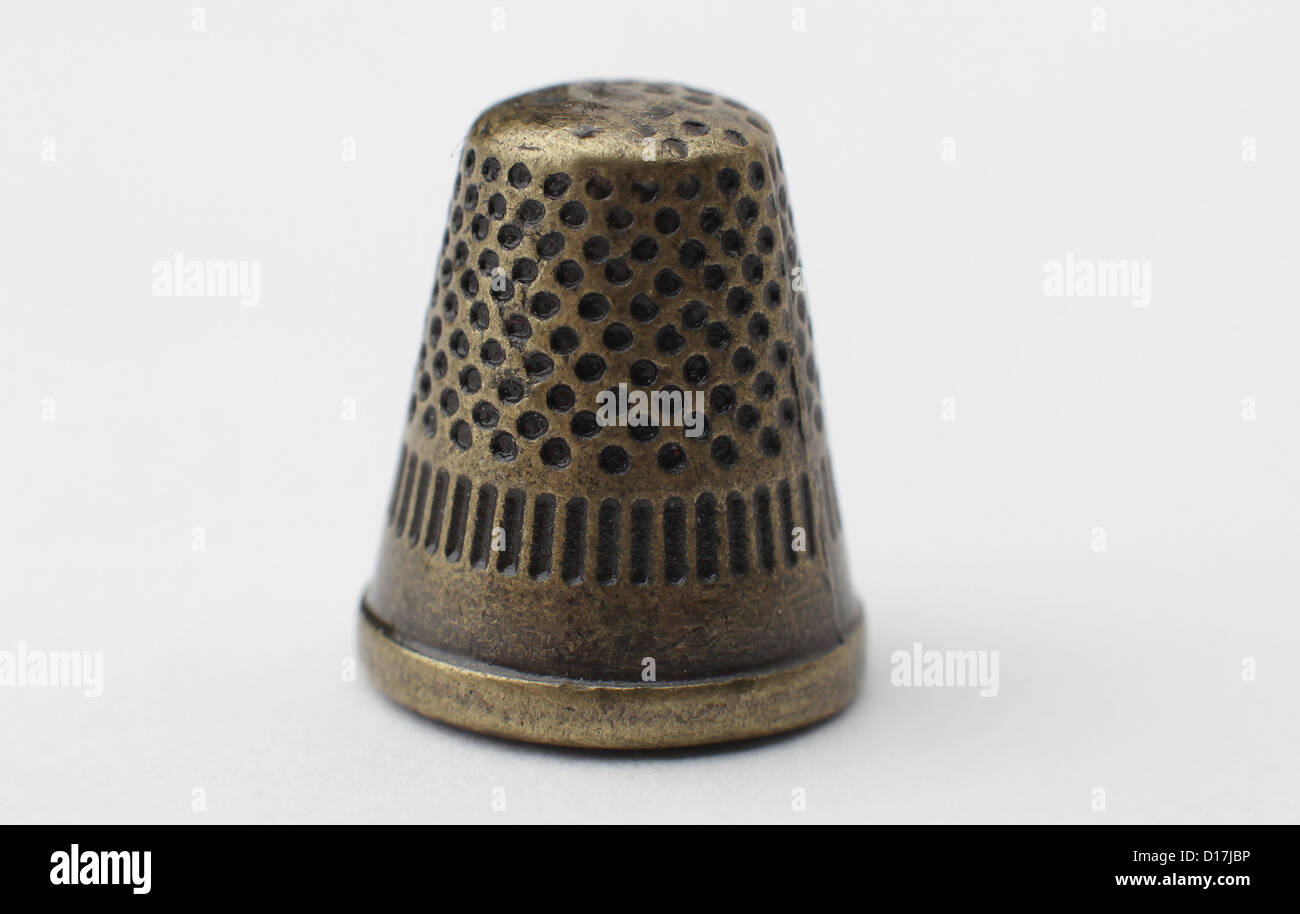 Metal thimble players piece from the board game Monopoly Stock Photo