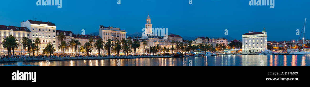 Dusk panoramic of the waterfront promenade in the city of Split on the Adriatic coast of Croatia. Stock Photo