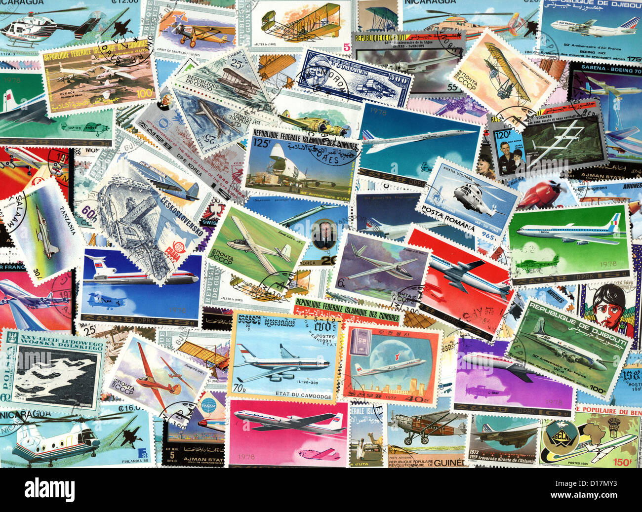 Airplanes and aviation background of old used postage stamps from the