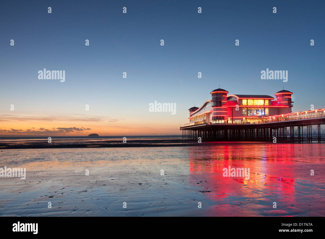 The new Grand Pier at Weston super Mare, Somerset, United Kingdom, at sunset, with reflections in the water. Stock Photo