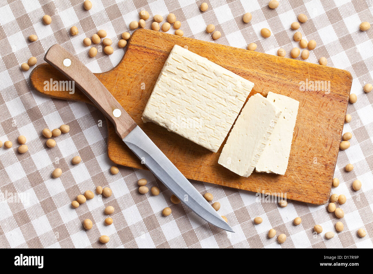 tofu and soy beans on kitchen table Stock Photo