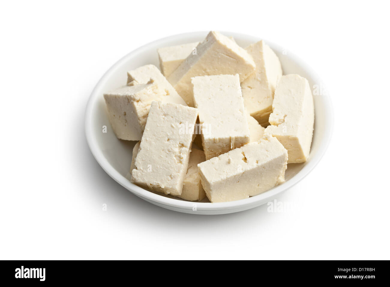 tofu in ceramic bowl on white background Stock Photo