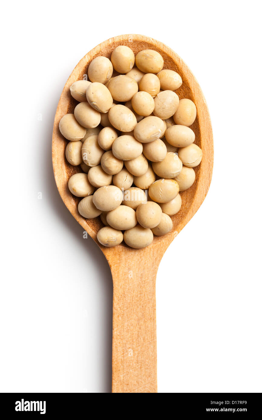 soy beans in wooden spoon on white background Stock Photo