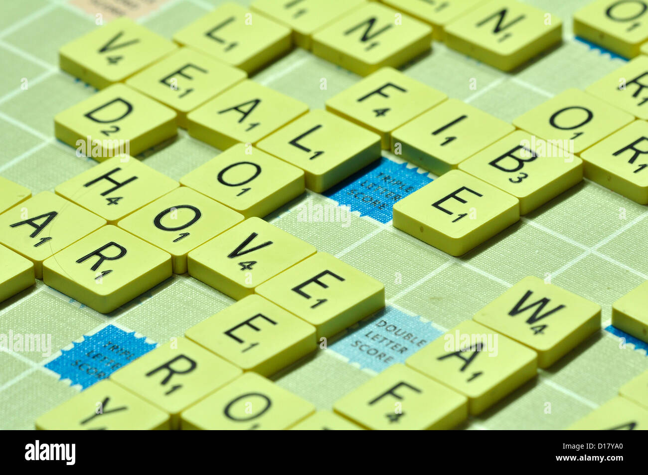 A game of Scrabble with many interlinking words in English UK Stock