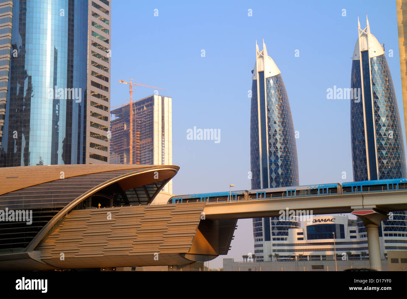 Dubai UAE,United Arab Emirates,Trade Centre,Sheikh Zayed Road,Financial Centre Metro Station,Red Line,subway,train,train,outside exterior,Park Tower 1 Stock Photo
