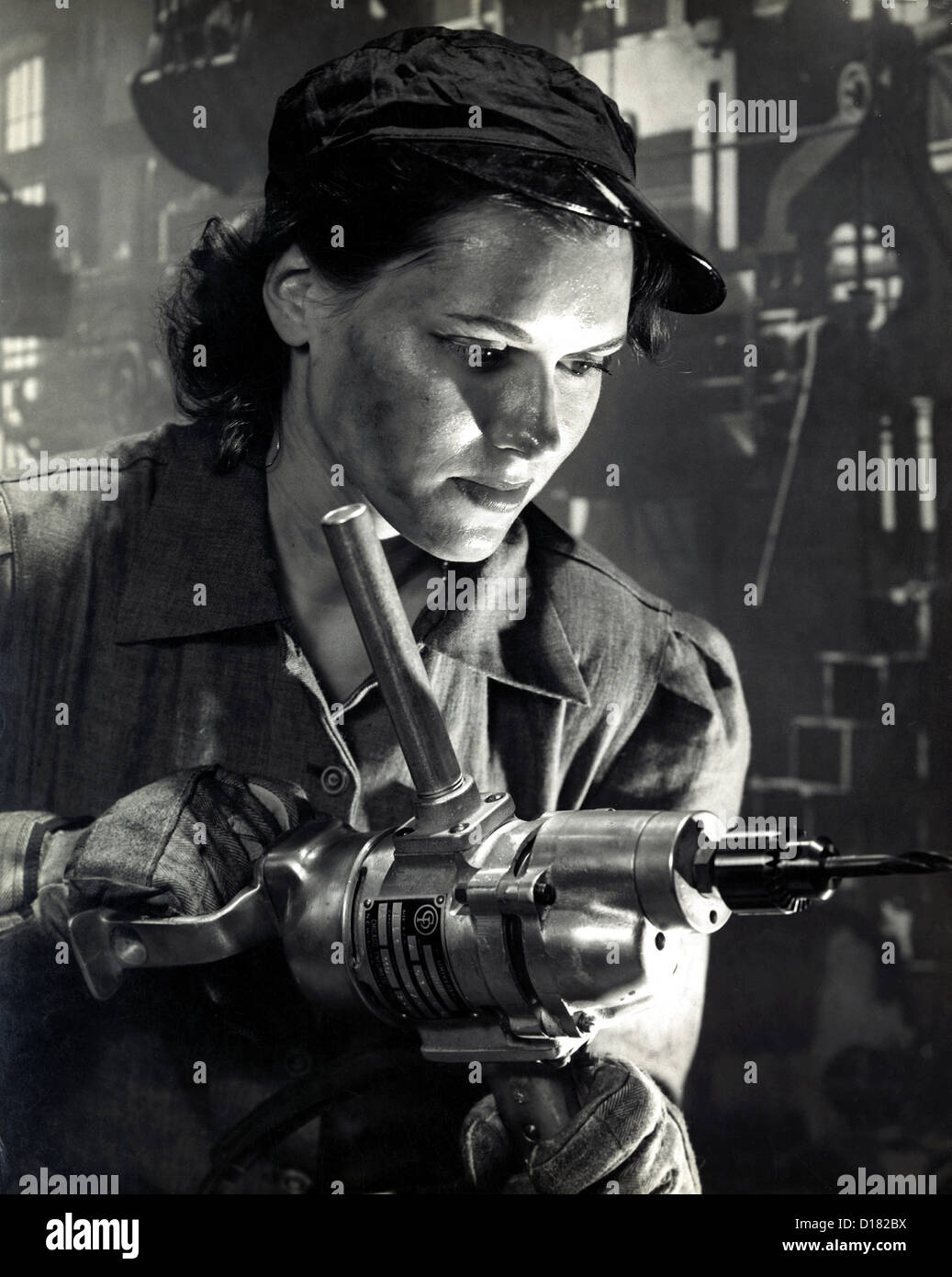 WWII female defense factory worker Stock Photo