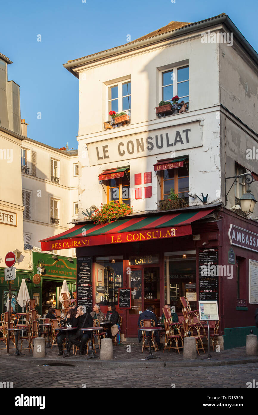 Outdoor seating at Le Consulat Cafe along Rue Norvins in Montmartre, Paris France Stock Photo