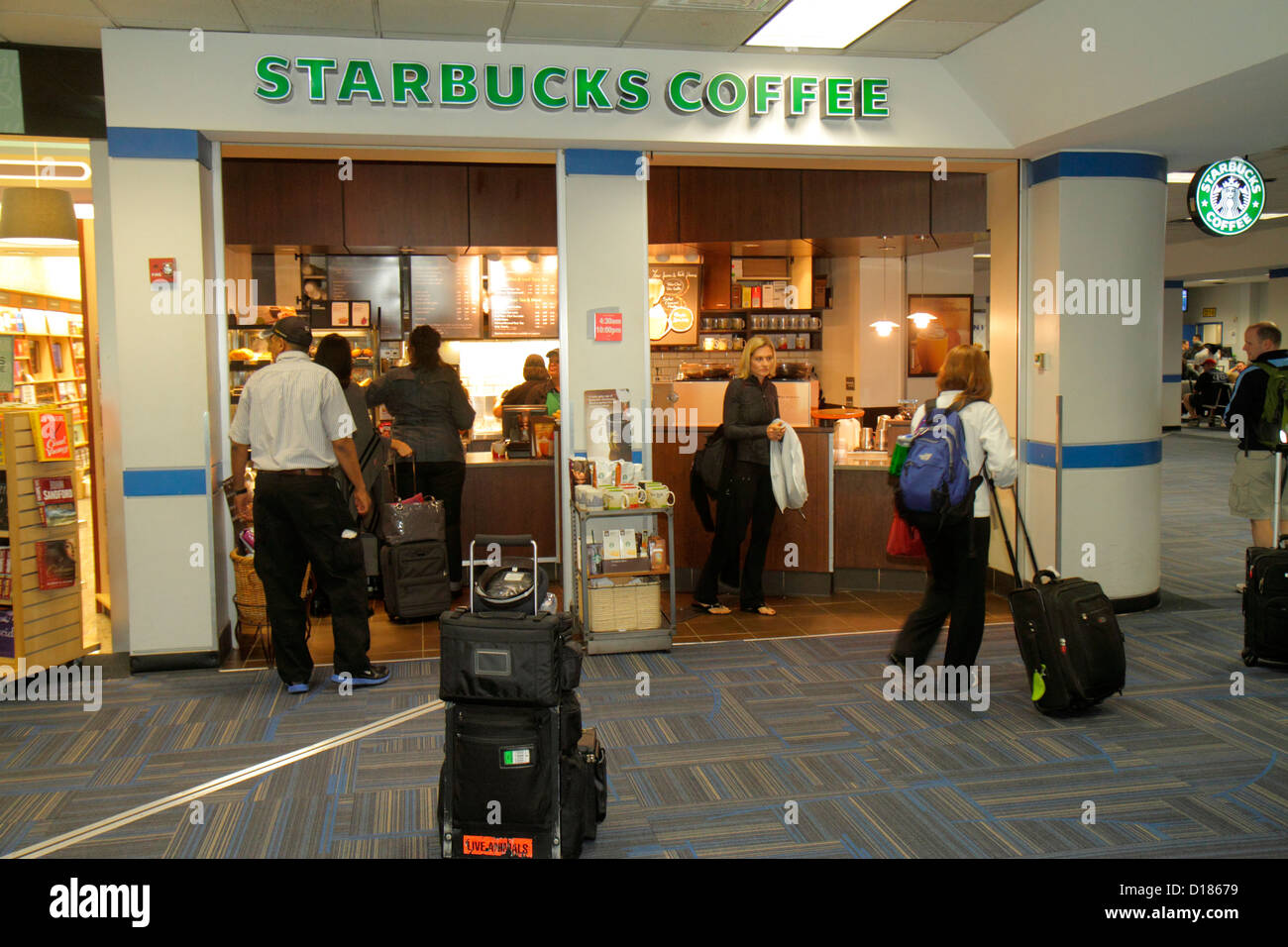 Virginia Sterling,Washington,DC D.C.,Dulles International Airport,IAD,gate,terminal,cafe,Starbucks Coffee,barista,front,travelers,visitors travel trav Stock Photo