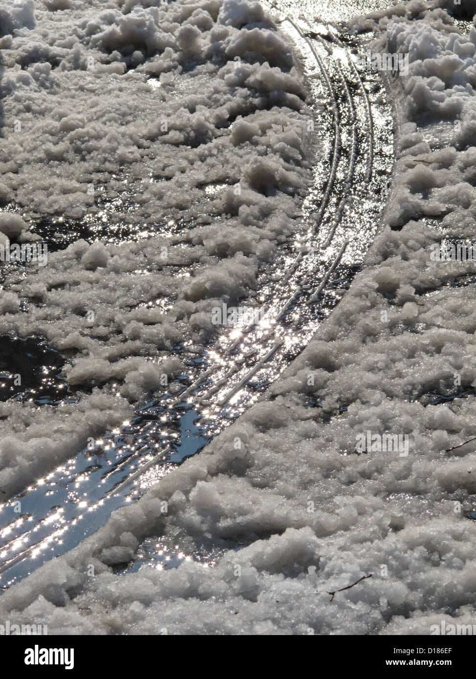 Car track marks in snow hi-res stock photography and images - Alamy
