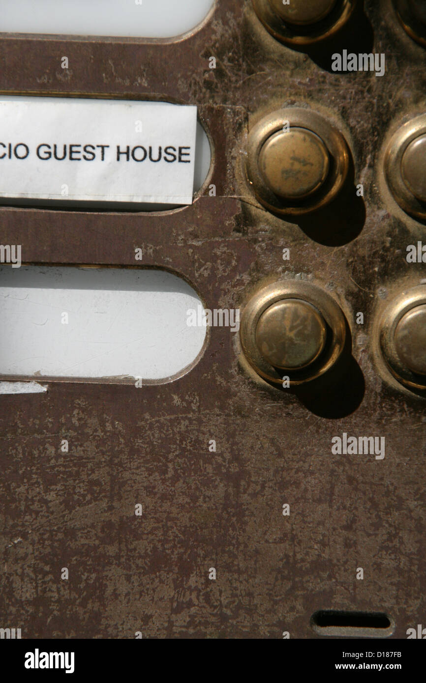 guest house brass door bell button in rome italy Stock Photo - Alamy