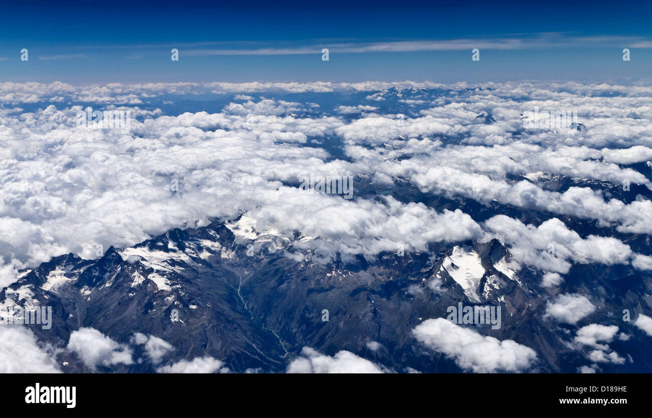 Italy, aerial view of the italian Alps and some clouds Stock Photo - Alamy