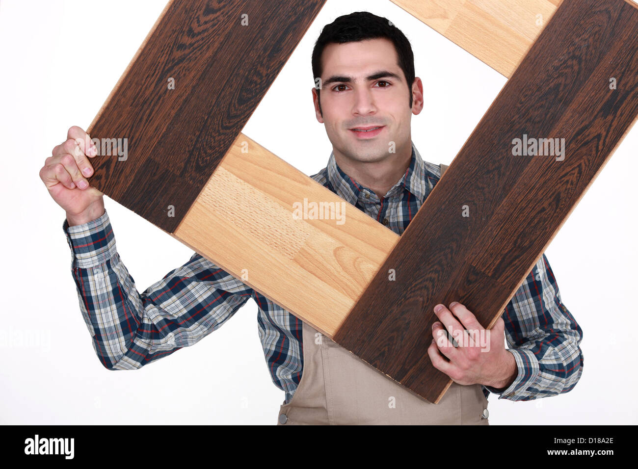 Carpenter building a frame Stock Photo Alamy