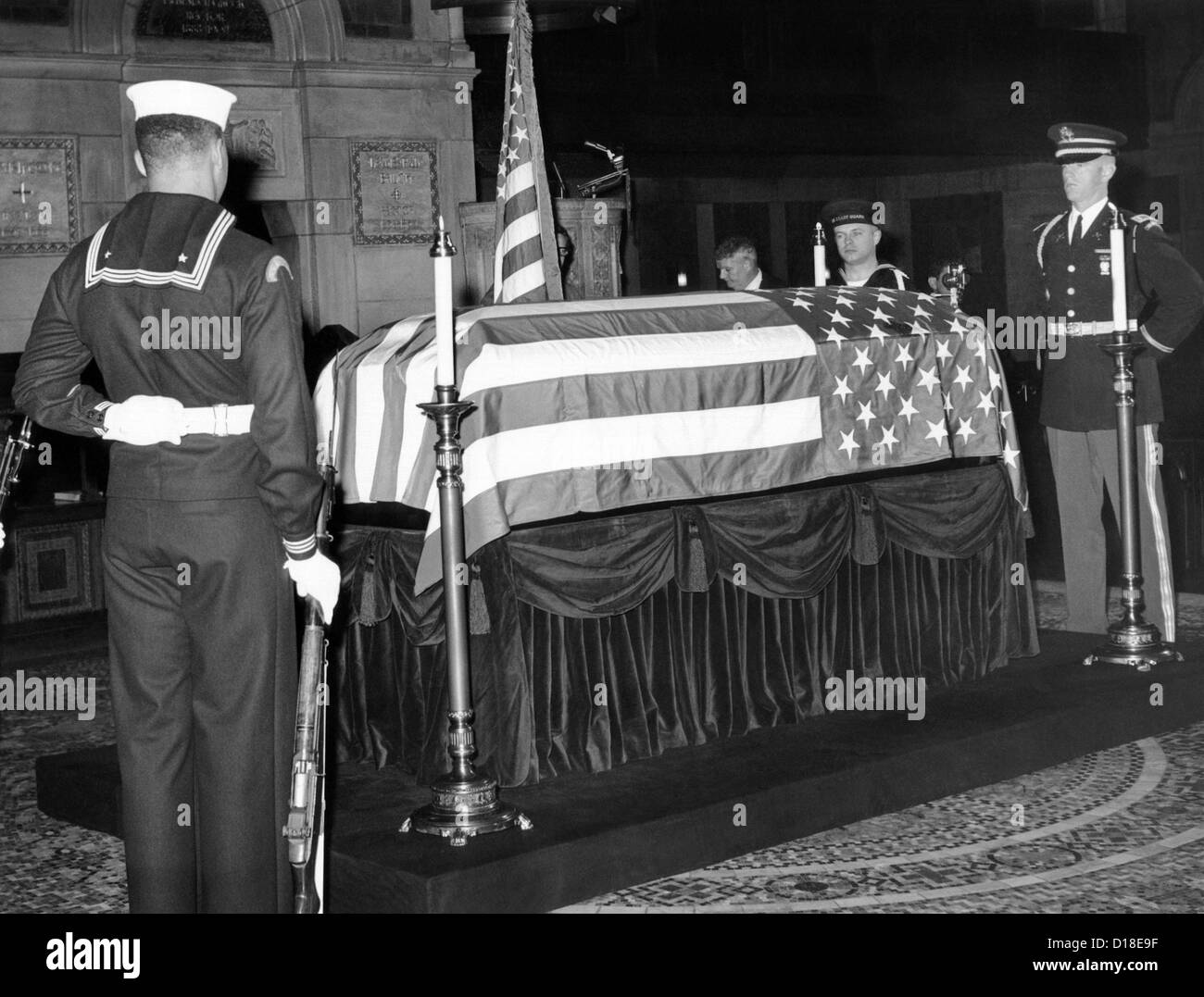 Former President Herbert Hoover's flag draped coffin. Armed force honor guards surround the casket in St. Bartholomew's Church, Stock Photo