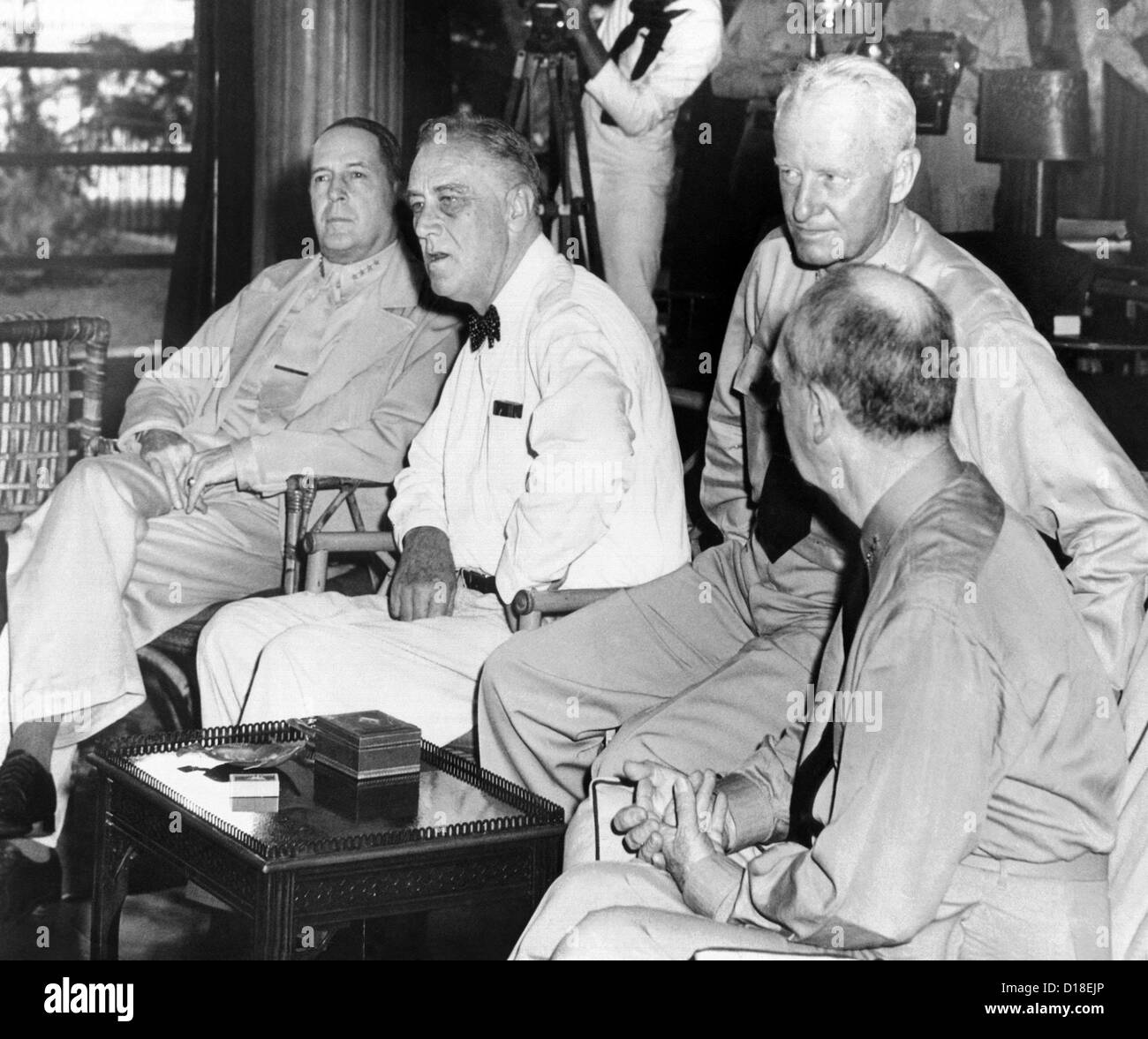 President Franklin Roosevelt at Pearl Harbor on June 11, 1944. L-R: General Douglas Mac Arthur; President Roosevelt; Admiral Stock Photo