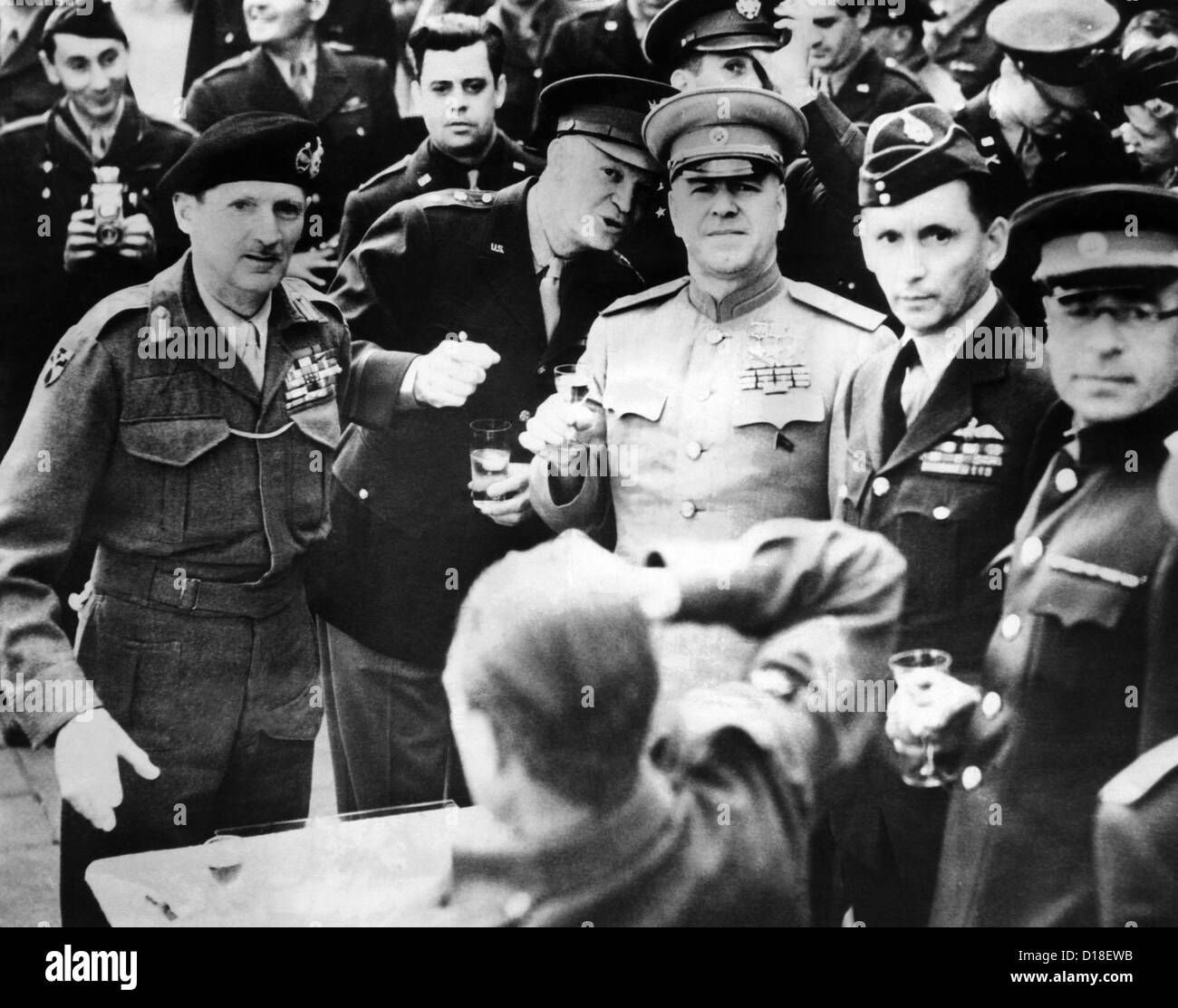 Allied leaders drink a victory toast at Frankfurt am Main, Germany. L-R: Field Marshall Sir Bernard Montgomery; Gen. Dwight Stock Photo
