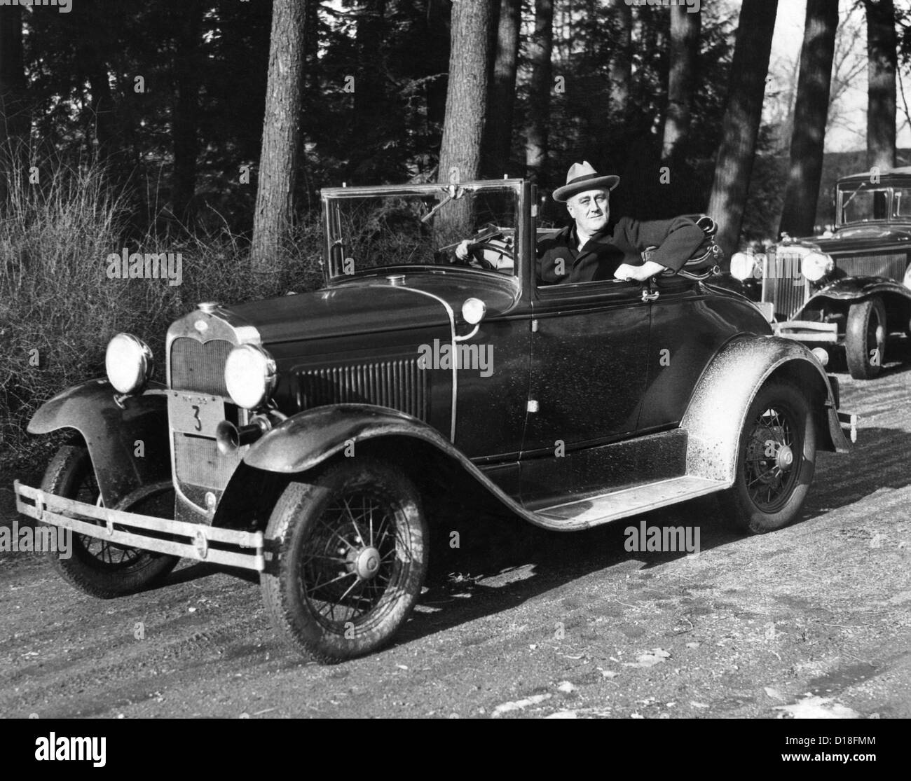 Presidentelect Franklin Roosevelt driving at Hyde Park, NY. His car