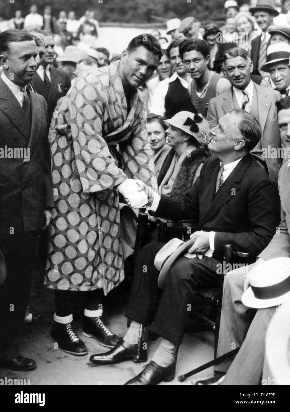 Governor Franklin D. Roosevelt shaking hands with boxer, Max Schemeling