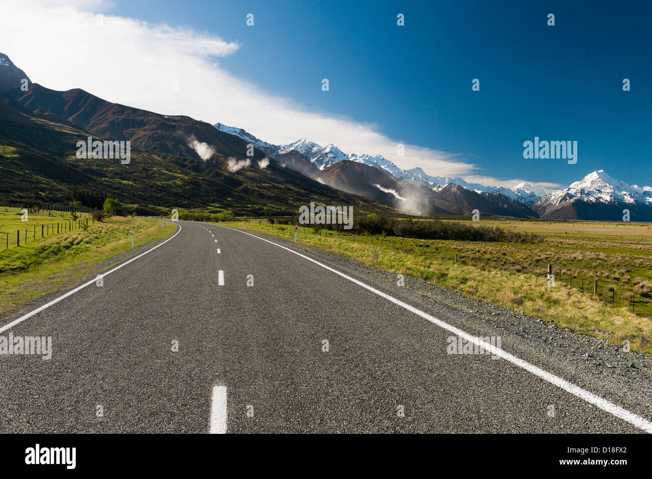 Paved road in rural landscape Stock Photo