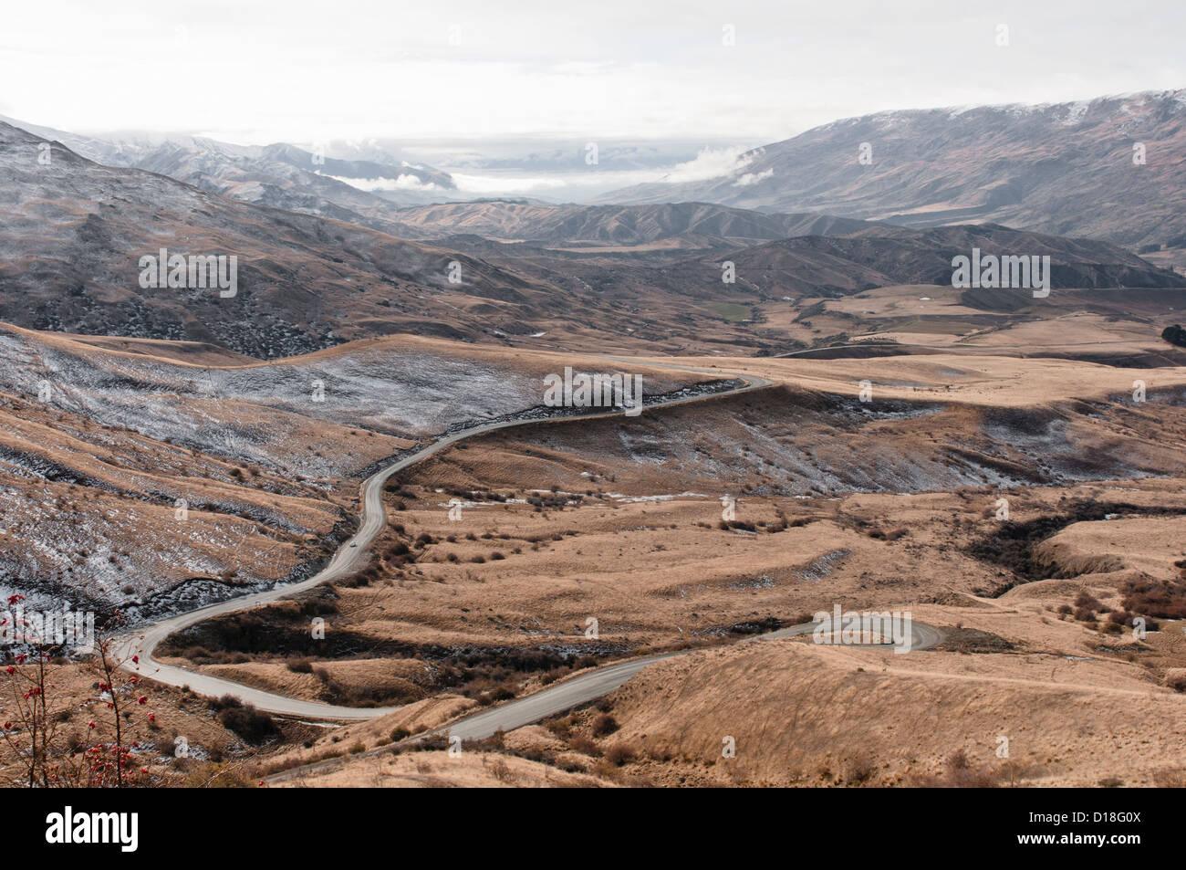 Curved road in rural landscape Stock Photo