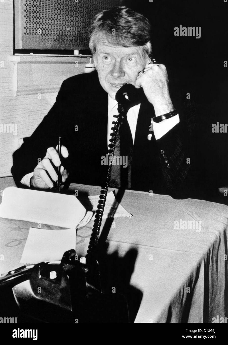 Georgia Governor Jimmy Carter, talking on the telephone during his Democratic Primary campaign. April 12, 1976. (CSU ALPHA 432) Stock Photo