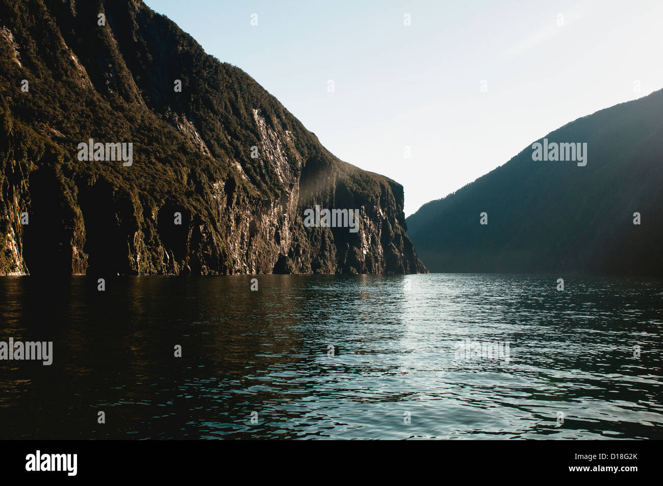 Lake and rocky mountain cliffs Stock Photo