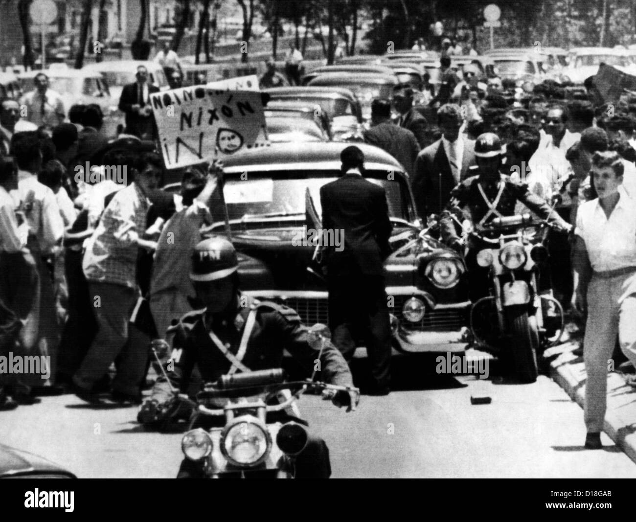 Vice President Richard Nixon's car is attacked by an angry mob in Caracas, Venezuela. Rioters smashed limousine's side windows Stock Photo