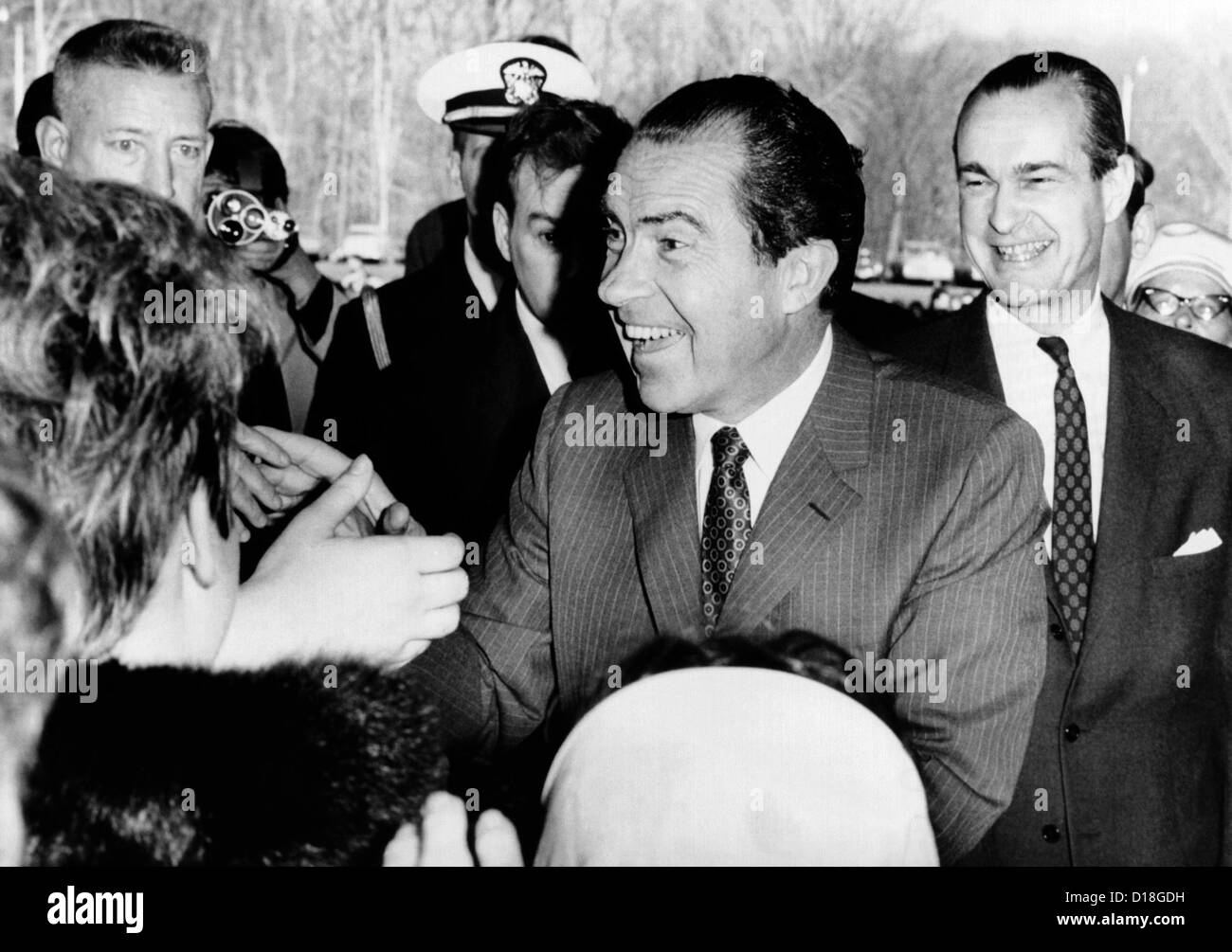 Employees of the Central Intelligence Agency greet President Nixon. At right is CIA Director Richard Helms. Mar. 7, 1969. Stock Photo