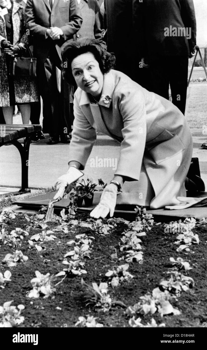 Lady Bird Johnson planting pansies on the famed Capitol Mall. She