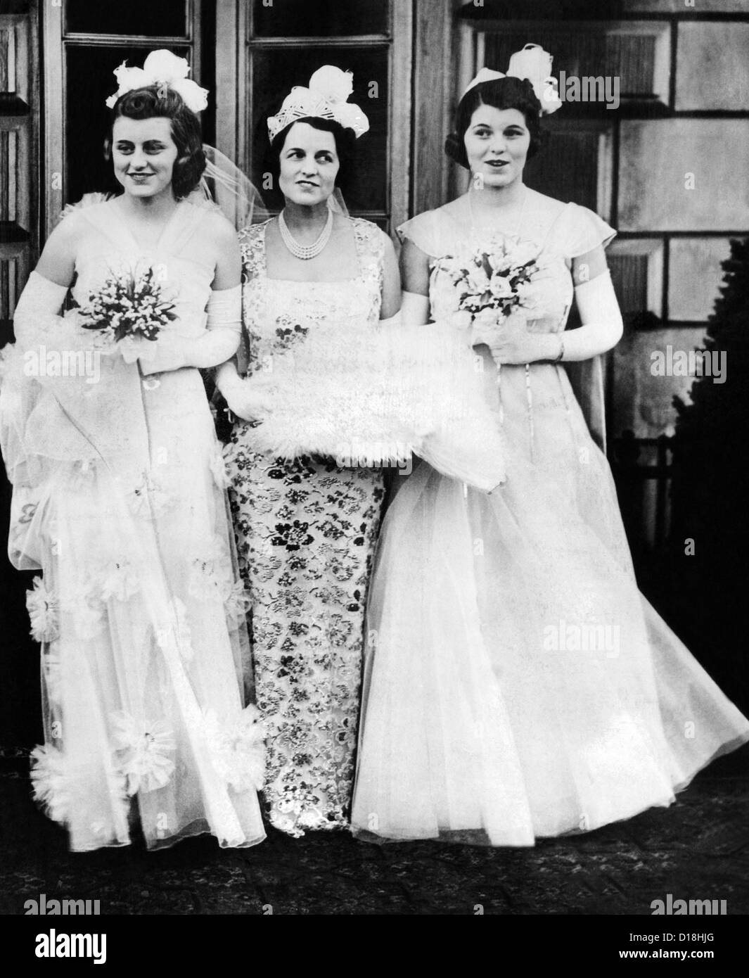 Kathleen, Rose, and Rosemary Kennedy, in formal gowns and with bouquets for  their presentation at Buckingham Palace. May 11 Stock Photo - Alamy