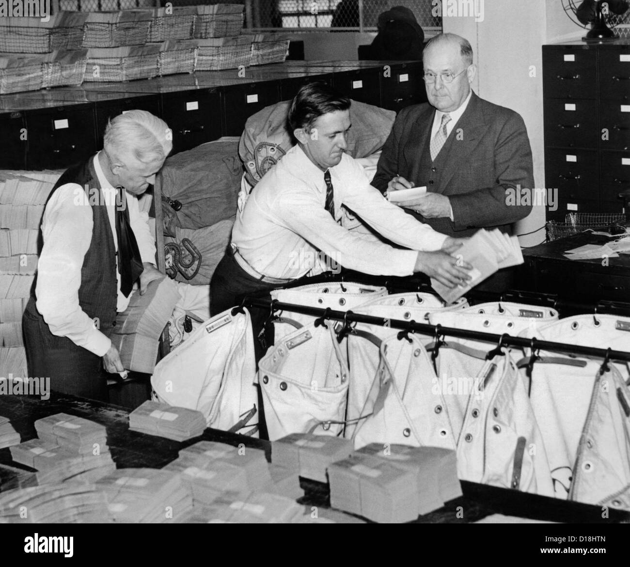 The first Social Security checks are mailed. Guy Allen, an officer of ...