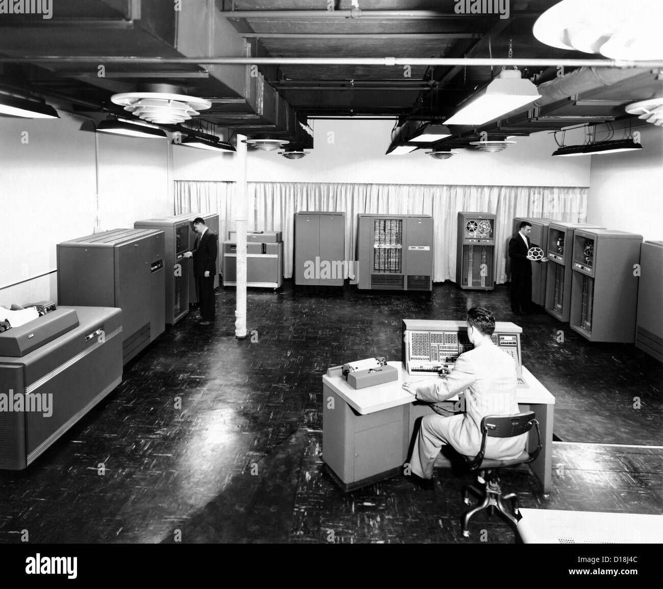 Partial view of the new IBM type '702' electronic data processing machine, a 'giant brain' designed for business. The '702' Stock Photo