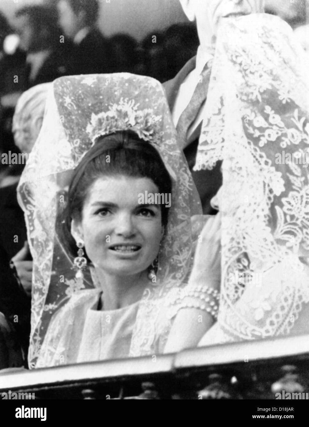 Jacqueline Kennedy wears a traditional lace mantilla to the bullfights in Seville, Spain. April 21, 1966 (CSU ALPHA 782) CSU Stock Photo