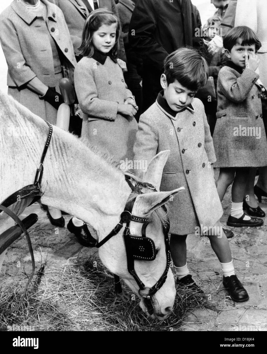 Caroline Kennedy, John F. Kennedy Jr., and their cousin, Anthony Radziwill, at the Belgian Village of New York World's Fair. Stock Photo