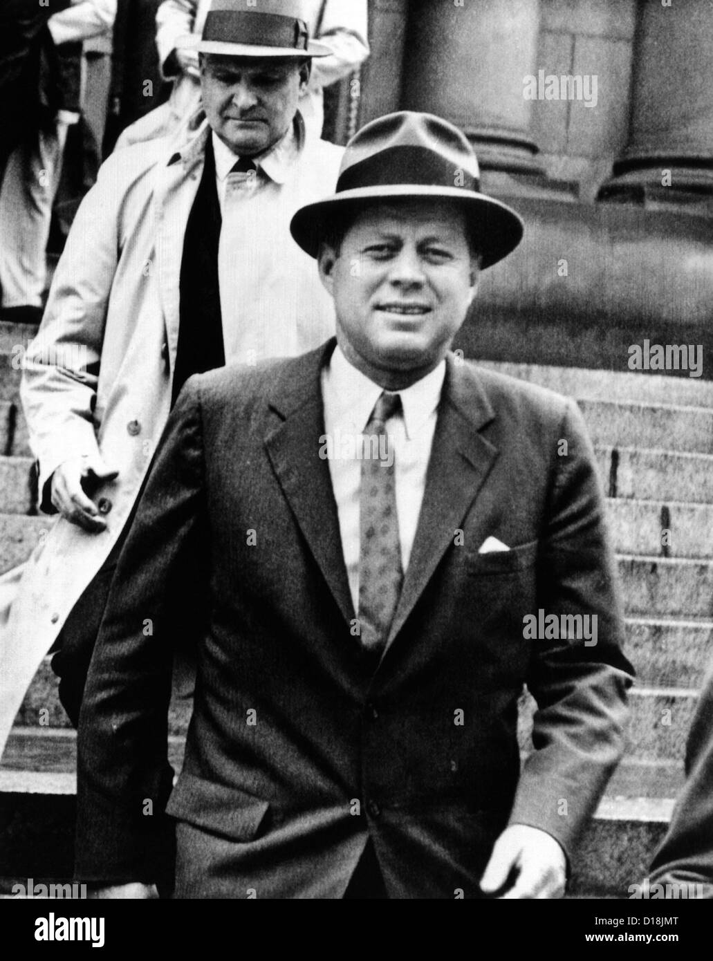 President Kennedy wearing a Fedora. He was leaving St. Mathews Cathedral in rainy weather. May 11, 1961 (CSU ALPHA 928) CSU Stock Photo