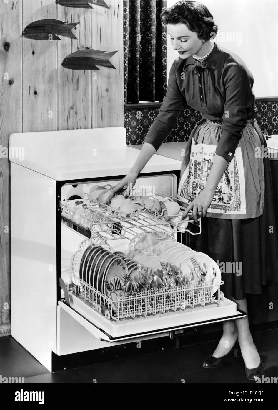 An automatic dishwasher was one of the first of the appliances to be made by Frigidaire. Dec. 1954. (CSU ALPHA 1595) CSU Stock Photo
