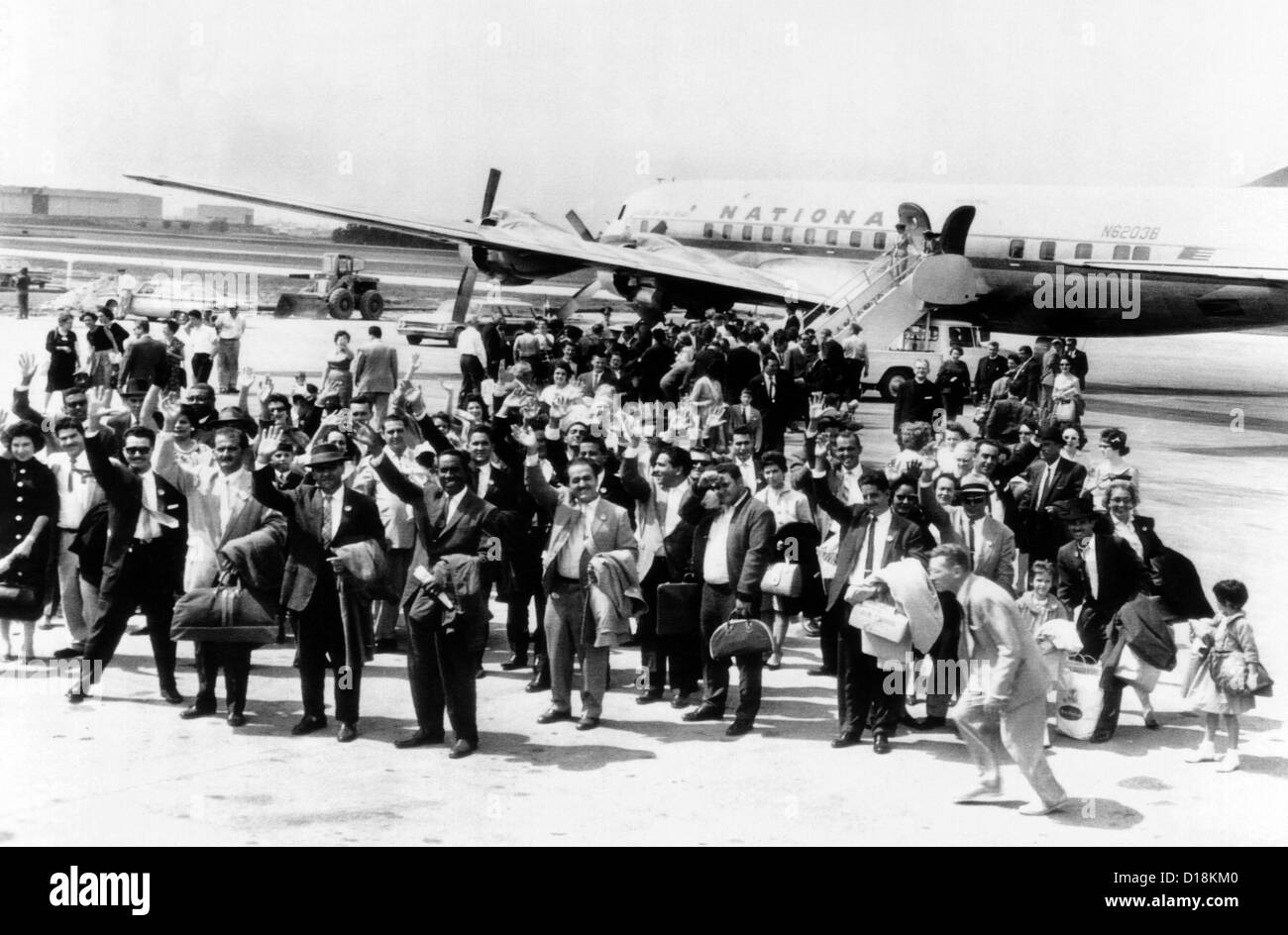Cuban refugee families arrive at Chicago's O'Hare field from Miami. 29 families were resettled under the sponsorship the Stock Photo