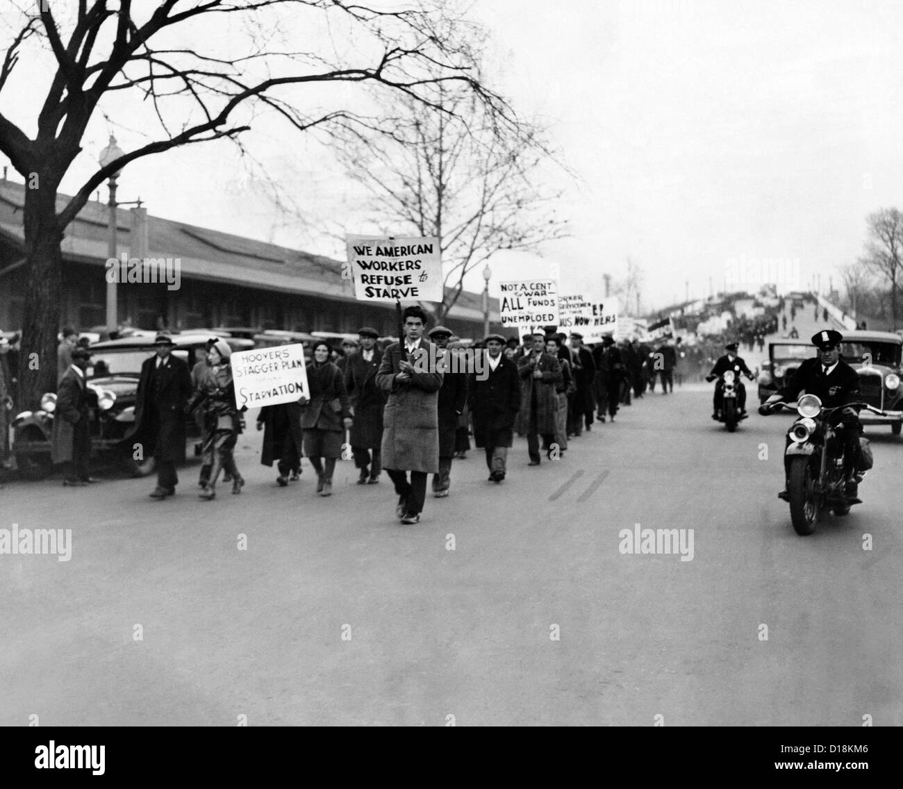 1400 Hunger Marchers arrive in Washington, DC. Their placards read; 'We American Workers Refuse to Starve'; and 'Not a Cent for Stock Photo