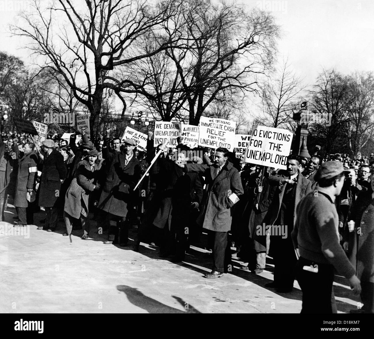 Hunger Marchers demonstrate in Washington, DC. Their placards read: 'We Demand Unemployment Insurance'; 'Free Milk for Workers Stock Photo