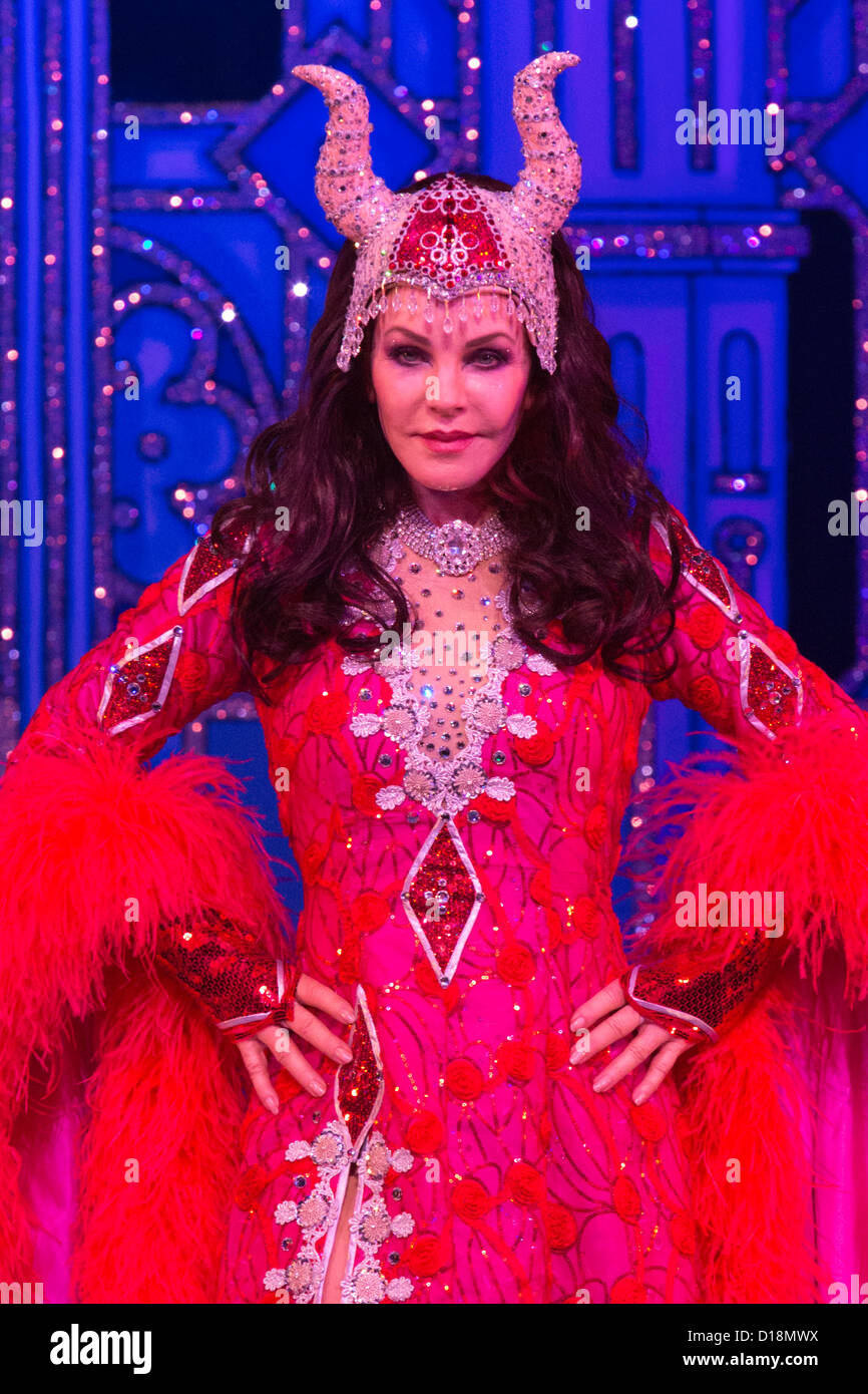 Priscilla Presley stars as the "Wicked Queen" in the Snow White and the  Seven Dwarfs panto at the New Wimbledon Theatre, London Stock Photo - Alamy