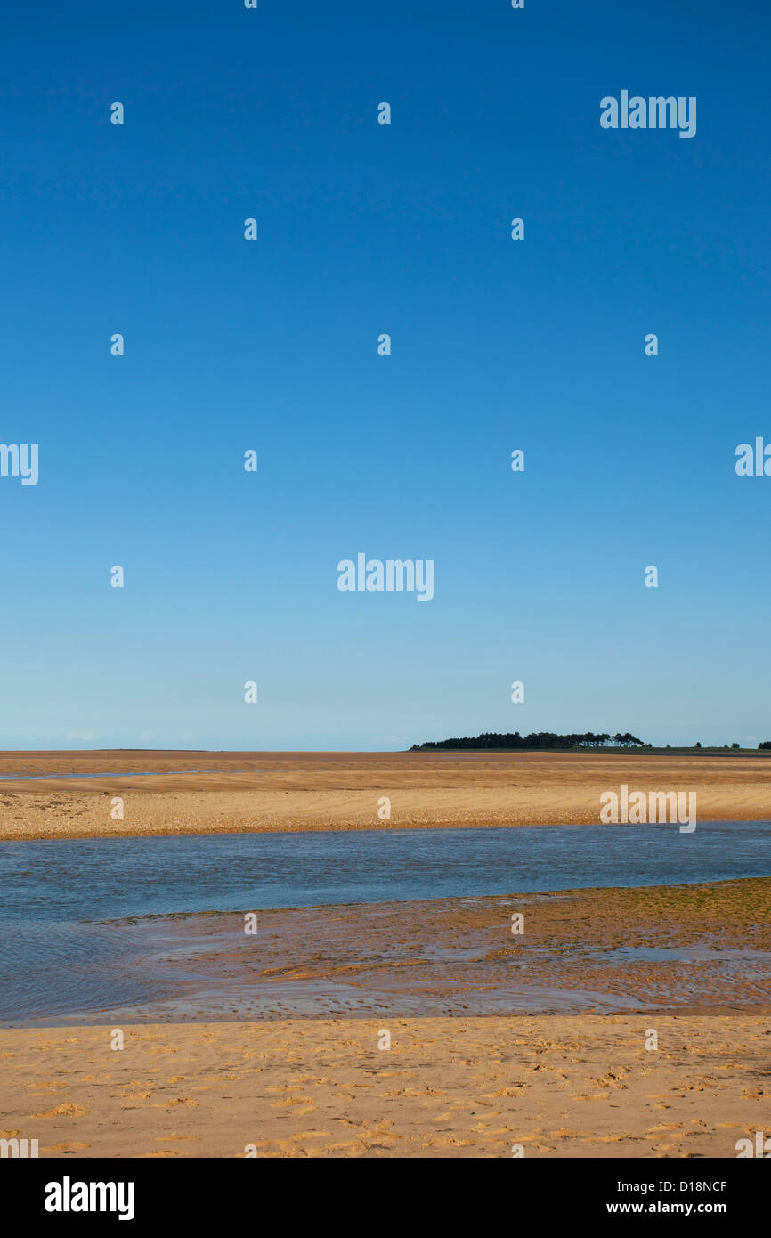 Sea sand and blue sky Stock Photo - Alamy