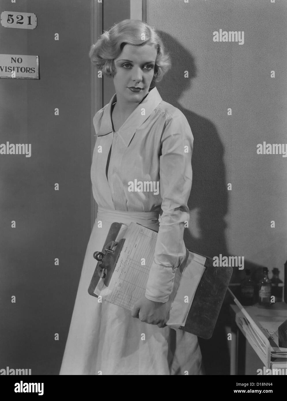 Vintage nurse standing hi-res stock photography and images - Alamy