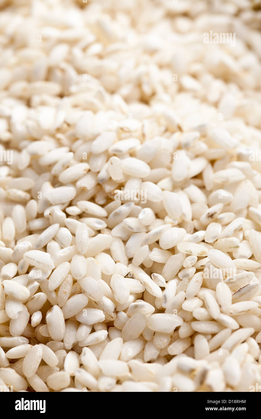the uncooked arborio rice background Stock Photo Alamy