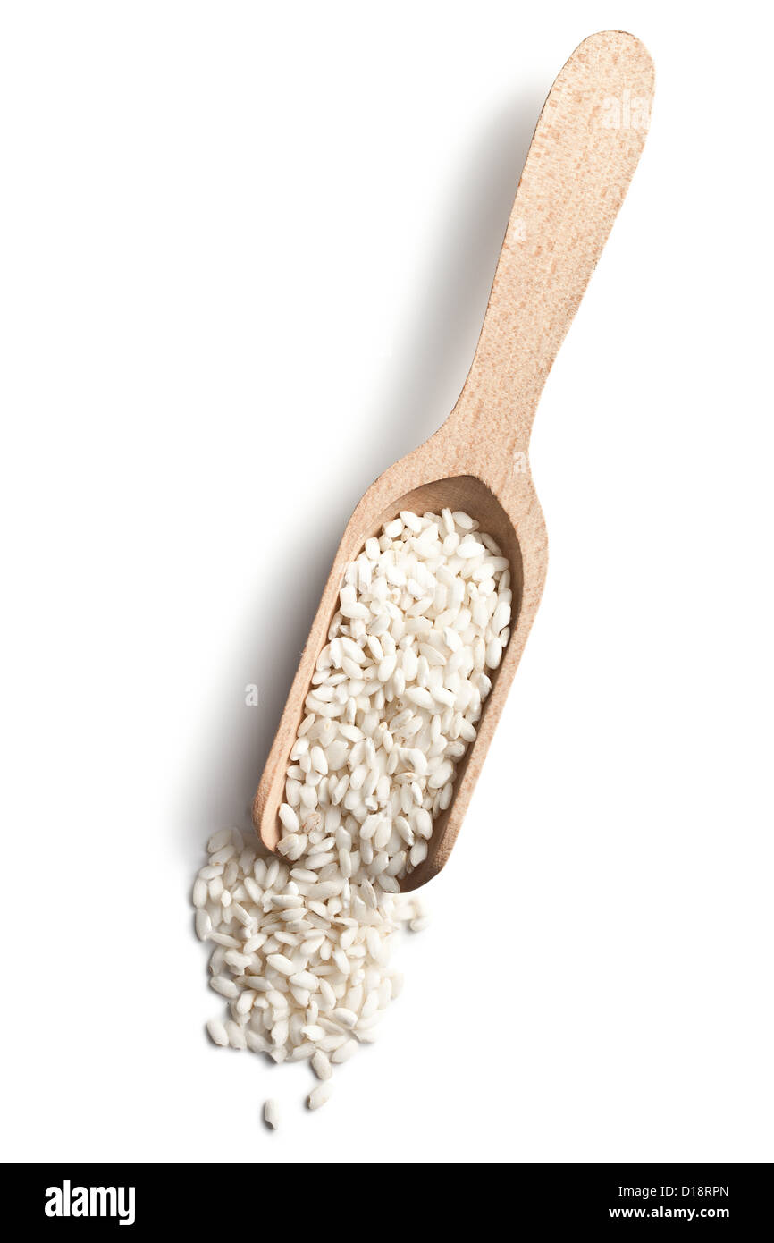 the uncooked arborio rice in scoop Stock Photo Alamy
