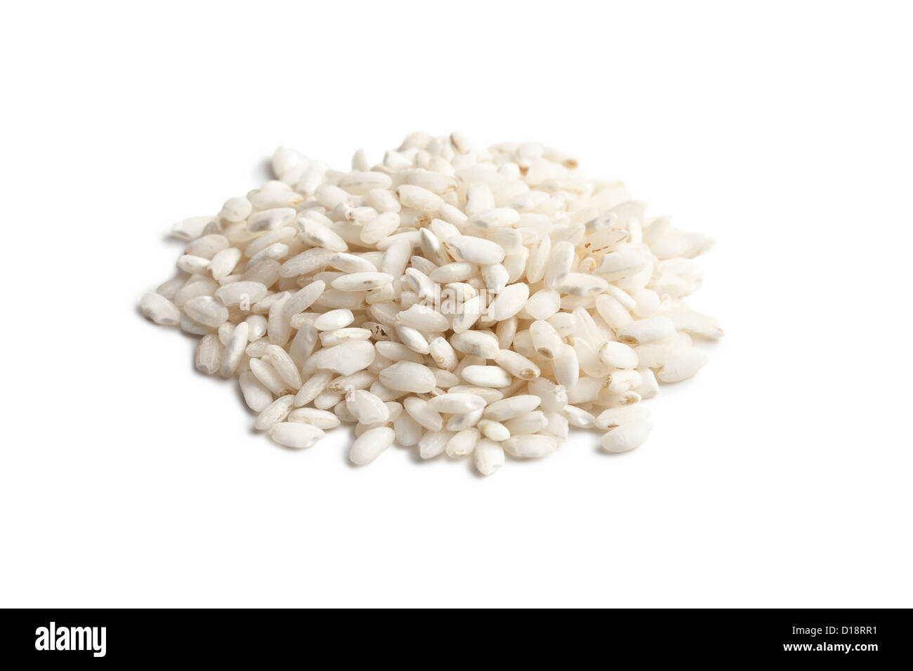 the uncooked arborio rice on white background Stock Photo