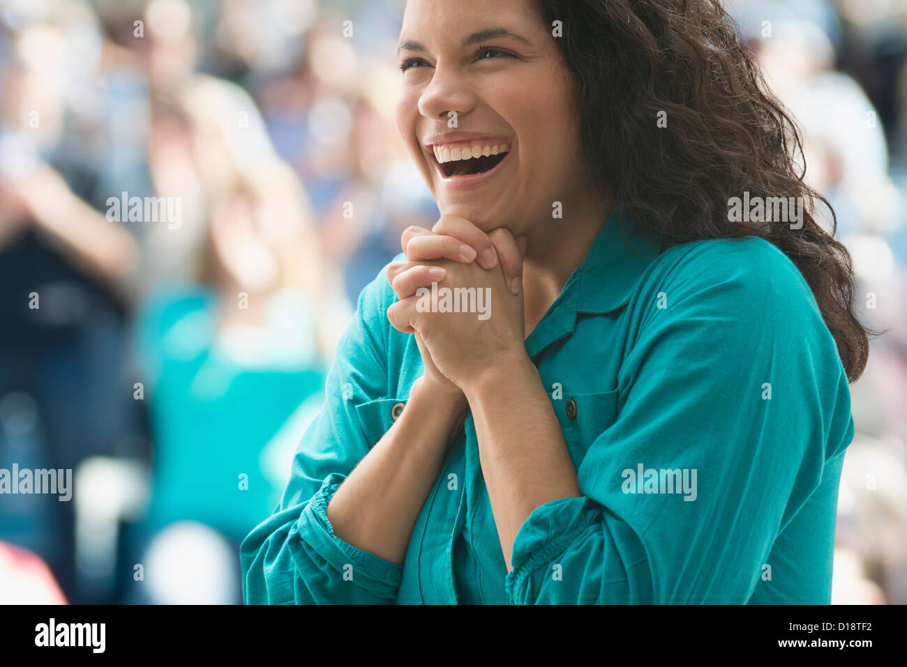 Excited female spectator Stock Photo