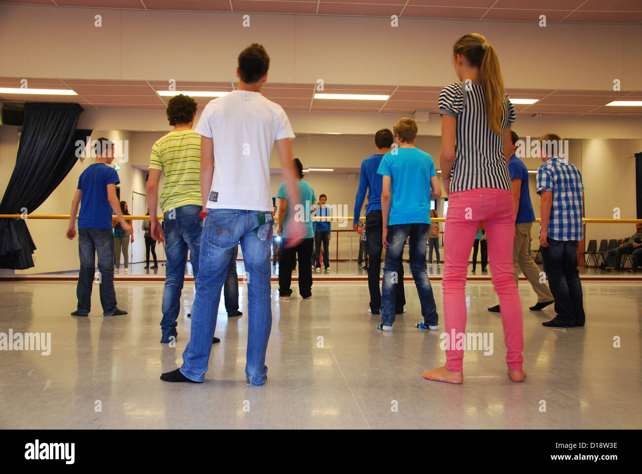 fitness class at the gym listening to instructor Stock Photo